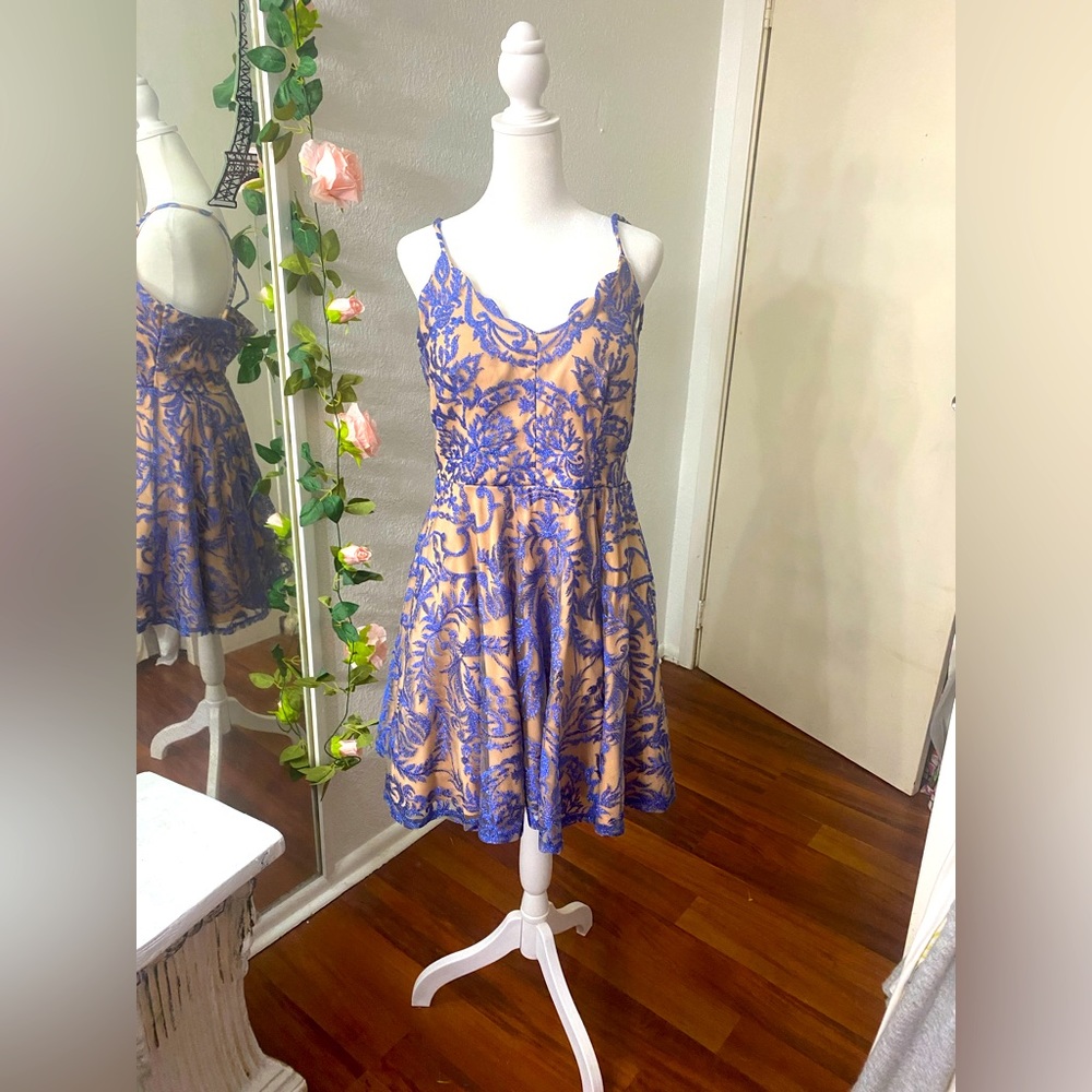 Flesh toned crystal blue dress with tool